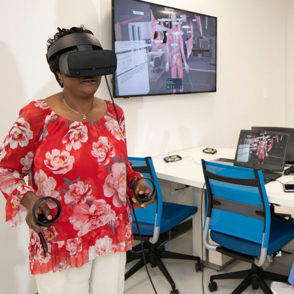 Professor using virtual reality glasses